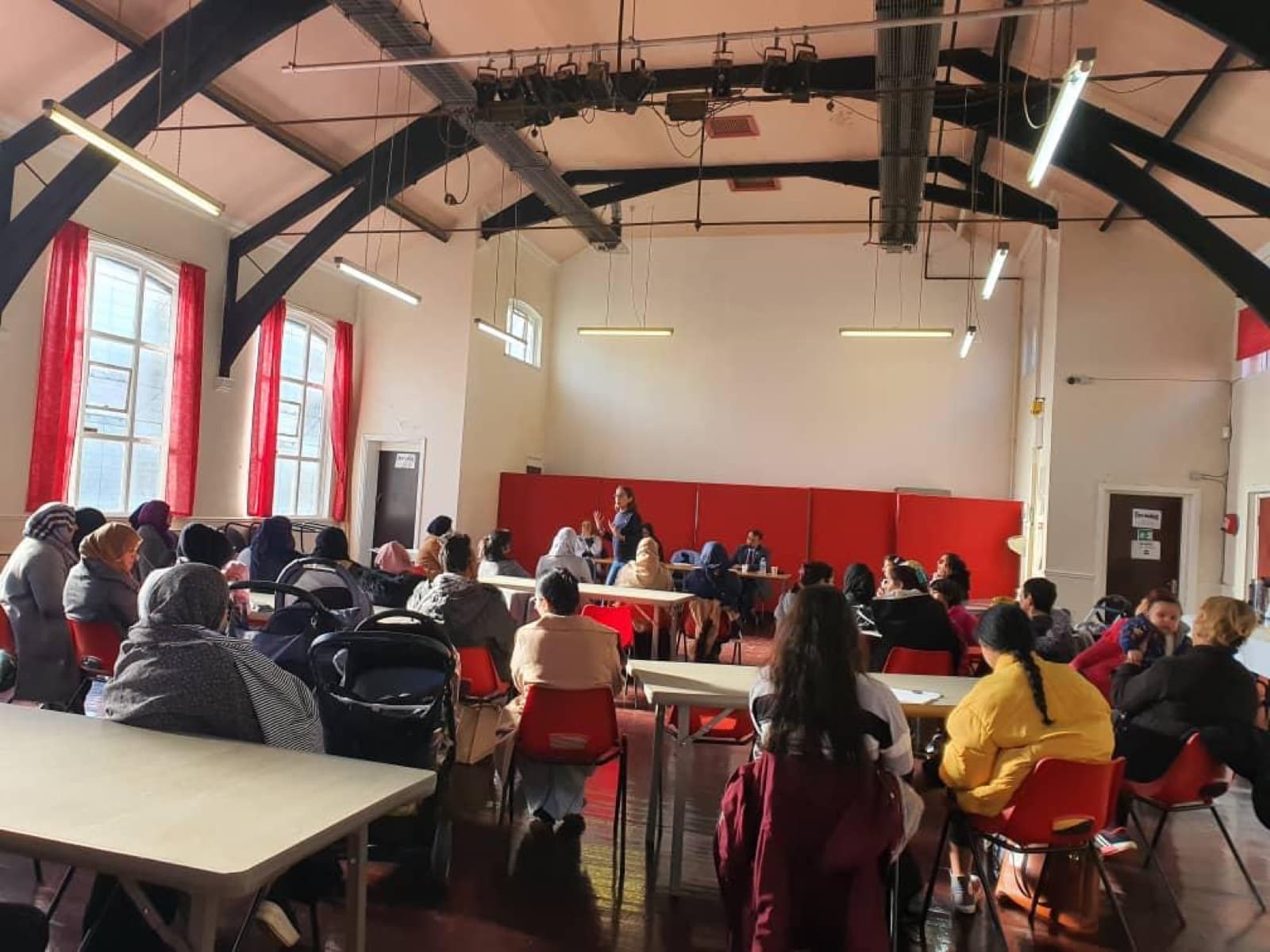 Volunteers taking part in a Women’s Voices community session